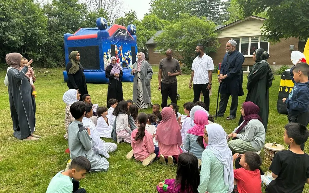 Families gathered at a community event at the Centre